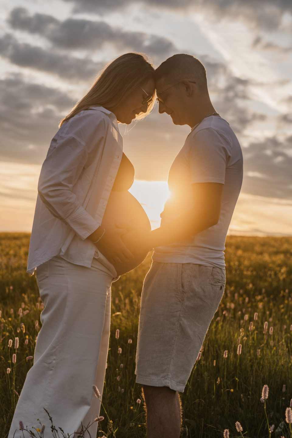 Shooting photo grossesse coucher de soleil